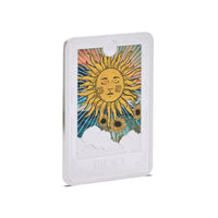 1 oz Niue Tarot Sun Coin in fine silver featuring a vibrant, detailed Tarot-inspired design with gold accents. A unique collectible with investment appeal.